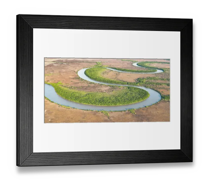 Framed Print : Aerial view of the lower Adelaide River flowing through seasonal floodplains in the late dry season, Northern Territory, Australia. October, 2024 Framed Print : Aerial view of the lower Adelaide River flowing through seasonal floodplains in the late dry season, Northern Territory, Australia. October, 2024