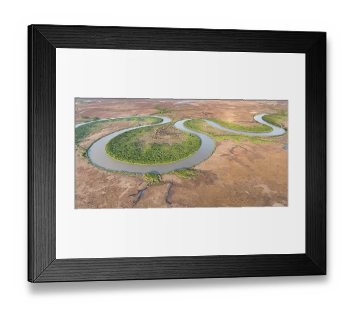 Framed Print : Aerial view of the lower Adelaide River flowing through seasonal floodplains in the late dry season, Northern Territory, Australia. October, 2024 Framed Print : Aerial view of the lower Adelaide River flowing through seasonal floodplains in the late dry season, Northern Territory, Australia. October, 2024