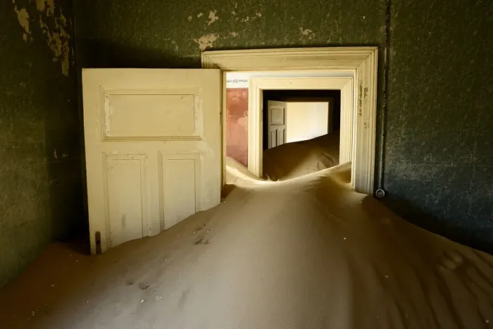 Framed Print : Abandoned house full of sand. Kolmanskop Ghost Town, an old diamond-mining town where Framed Print : Abandoned house full of sand. Kolmanskop Ghost Town, an old diamond-mining town where
