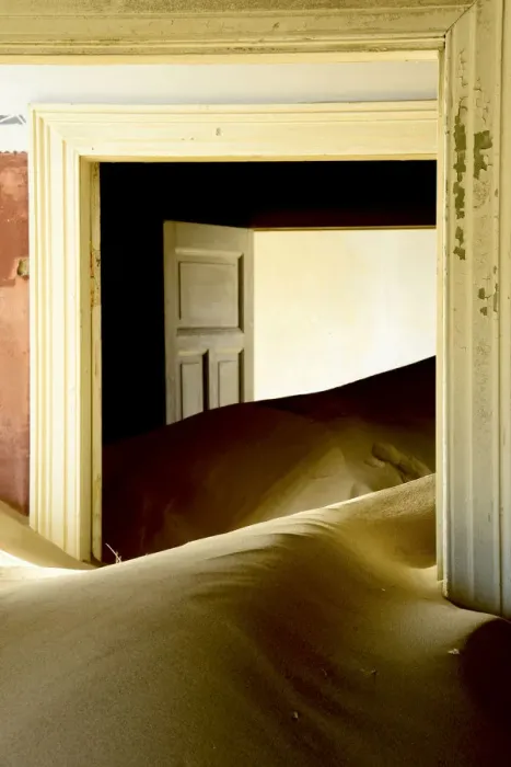Framed Print : Abandoned house full of sand. Kolmanskop Ghost Town, an old diamond-mining town where Framed Print : Abandoned house full of sand. Kolmanskop Ghost Town, an old diamond-mining town where