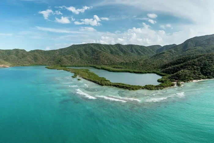 Framed Print : Aerial view of coastline and mangrove wetlands along Chengue Bay Tayrona National Park, Colombia, Caribbean Sea. December, 2021 Framed Print : Aerial view of coastline and mangrove wetlands along Chengue Bay Tayrona National Park, Colombia, Caribbean Sea. December, 2021