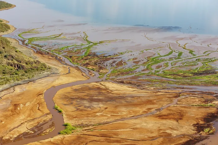 Framed Print : Aerial view of freshwater estuary entering the lake after heavy rains, Lake Magadi, Kenya. February, 2024 Framed Print : Aerial view of freshwater estuary entering the lake after heavy rains, Lake Magadi, Kenya. February, 2024