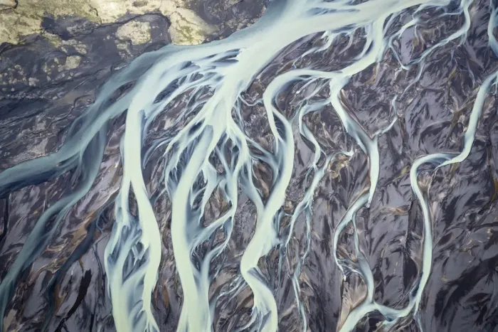 Framed Print : Aerial view of a glacier river flowing from glacier which is melting at an unprecedented pace due to rising temperatures and reduced snowfall, Vatnajookull Glacier, South Iceland. 29th May 2022 Framed Print : Aerial view of a glacier river flowing from glacier which is melting at an unprecedented pace due to rising temperatures and reduced snowfall, Vatnajookull Glacier, South Iceland. 29th May 2022