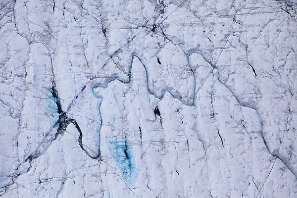 Aerial view of meltwater channels in ice cap north-east of Sermeq Kujalleq Glacier