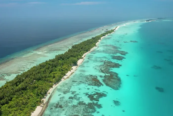 Framed Print : Aerial view of narrow coral atoll island with palm trees and white sand beach surrounded by reef, Dhigurah Island, South Ari Atoll, Maldives, Indian Ocean. February, 2020