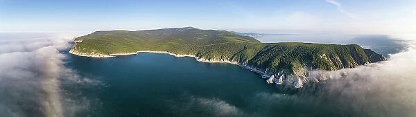 Aerial view of Wrangel Bay, Russia, one of the locations where bowhead whales (Balaena mysticetus) of the endangered Sea of Okhotsk subpopulation visit during the summer. The shallow waters of the bay provide a refuge from orcas