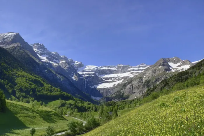 Framed Print : Alpine meadows and mountains above Gavarnie village with the Cirque de Gavarnie in the distance Framed Print : Alpine meadows and mountains above Gavarnie village with the Cirque de Gavarnie in the distance