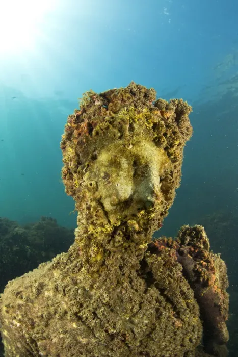Framed Print : Ancient Roman statue of Antonia minor, member of Julio-Claudian dynasty, daughter of Marcus Anthony and sister of emperor Augustus, located in submerged Nymphaeum of Emperor Claudius. Marine Protected Area of Baia, Naples, Italy. Tyrrhenian sea