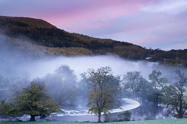 Autumn mist in Dee Valley (Dyffryn Dyfrdwy) at Horseshoe falls, near Llangollen, Denbighshire