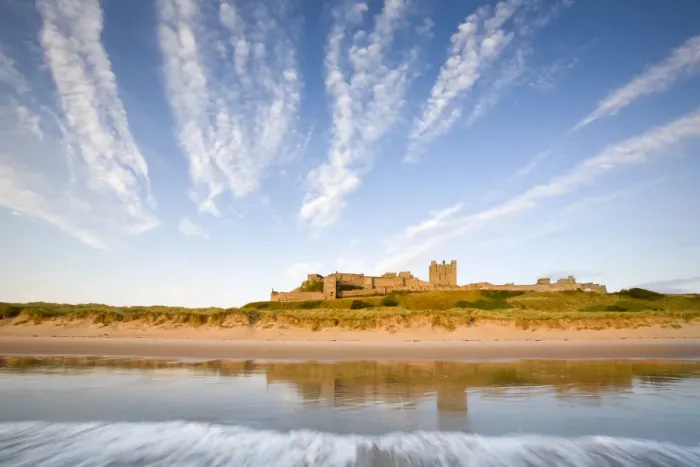 Framed Print : Bamburgh Castle shortly after high tide, Northumberland, UK. July 2009 Framed Print : Bamburgh Castle shortly after high tide, Northumberland, UK. July 2009