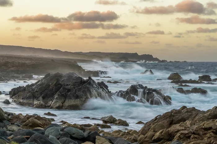 Framed Print : Breaking waves on the rocky shore of Aruba, Caribbean Sea. January, 2024