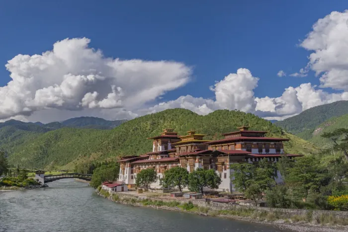 Framed Print : Bridge to Punakha Dzong, built on the confluence of the Mo Chhu (female Framed Print : Bridge to Punakha Dzong, built on the confluence of the Mo Chhu (female