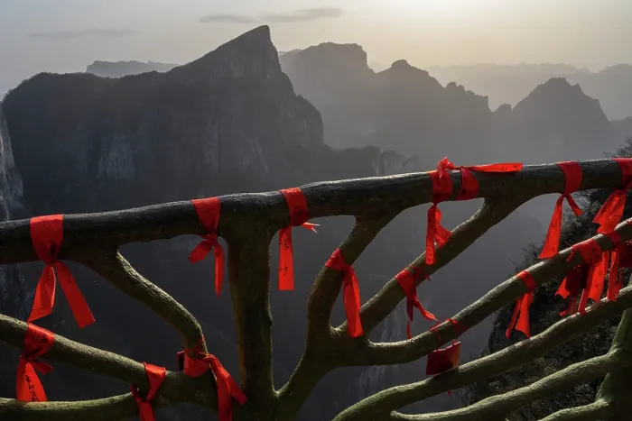 Framed Print : Buddhist prayer flags tied on ornate railings, to bring good luck, Tianmen Mountain National Park, Zhangjiajie, Hunan, China. March, 2024