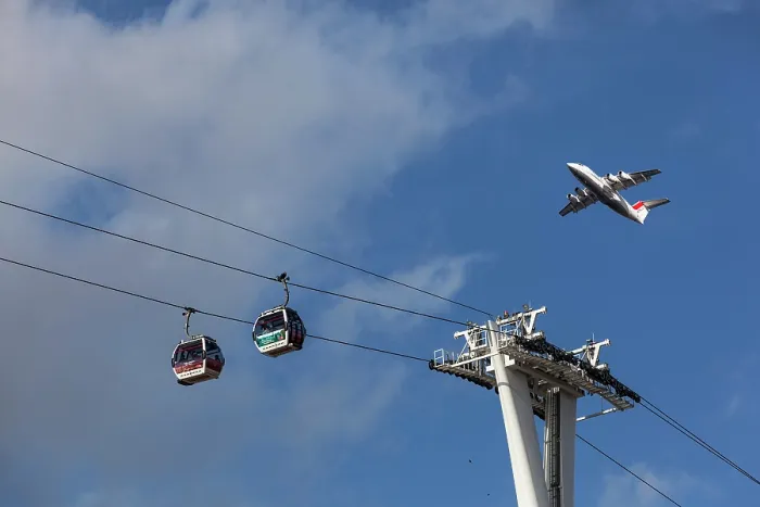 Framed Print : Cable cars across the River Thames at Greenwich with aeroplane high above, Greenwich, London, England, UK. October, 2014 Framed Print : Cable cars across the River Thames at Greenwich with aeroplane high above, Greenwich, London, England, UK. October, 2014