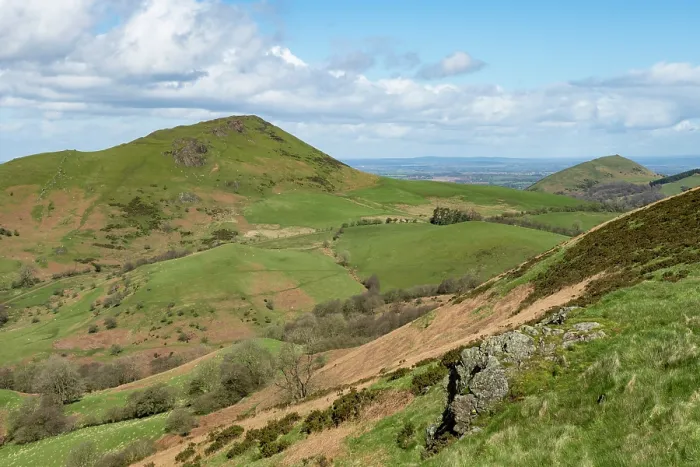 Framed Print : Caer Caradoc Hill and The Lawley composed of volcanic rock from the Precambrian Period viewed from Hope Bowdler Hill, Shropshire Hills National Landscape, England, UK. March, 2024