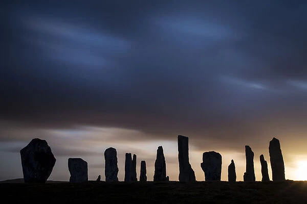 Callanish Stones silhouetted at dawn, Isle of Lewis, Outer Hebrides, Scotland, UK