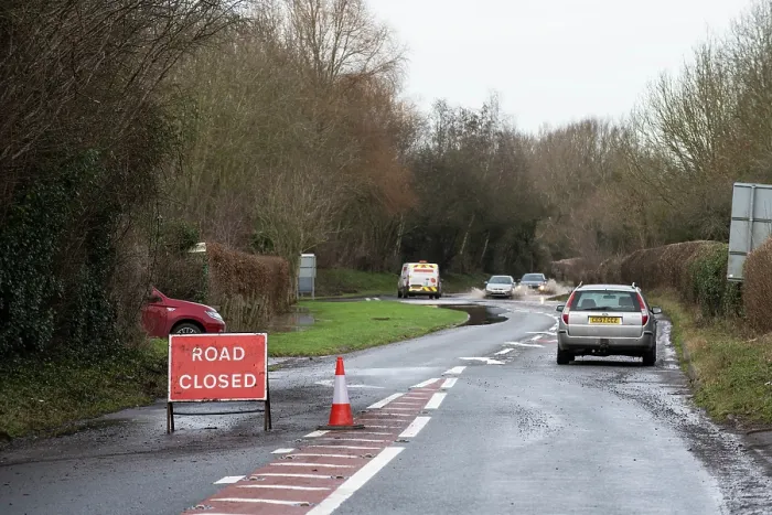 Framed Print : Closed road with an abandoned vehicle at roadside and vehicles driving through floodwater, Hereford Road, south of Leominster, River Arrow flood plain, Herefordshire, England, UK Framed Print : Closed road with an abandoned vehicle at roadside and vehicles driving through floodwater, Hereford Road, south of Leominster, River Arrow flood plain, Herefordshire, England, UK