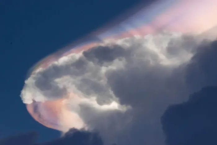 Framed Print : Cloud iridescence forming above a cumulonimbus cloud, caused by light refraction Framed Print : Cloud iridescence forming above a cumulonimbus cloud, caused by light refraction