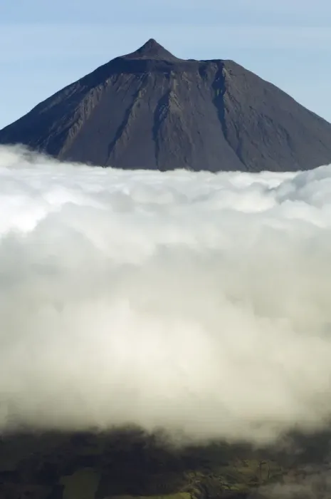 Framed Print : Clouds around Pico, the highest mountain in Portugal, sticking out through a loayer of clouds Framed Print : Clouds around Pico, the highest mountain in Portugal, sticking out through a loayer of clouds