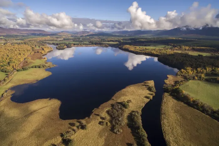 Framed Print : Clouds reflecting in Loch Insh surrounded by Insh Marshes, Cairngorms National Park, Scotland, UK. October, 2017 Framed Print : Clouds reflecting in Loch Insh surrounded by Insh Marshes, Cairngorms National Park, Scotland, UK. October, 2017