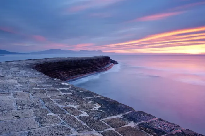 Framed Print : The Cobb, Lyme Regis, colourful sunrise, West Dorset, UK. England, January 2010 Framed Print : The Cobb, Lyme Regis, colourful sunrise, West Dorset, UK. England, January 2010