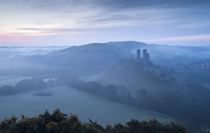 Framed Print : Corfe Castle, early morning mist and sunrise, Corfe, Dorset, England, UK. April 2010 Framed Print : Corfe Castle, early morning mist and sunrise, Corfe, Dorset, England, UK. April 2010