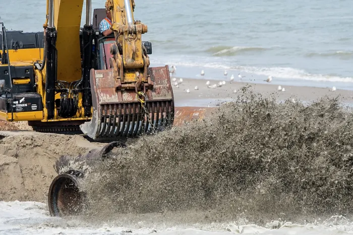 Framed Print : Crawler hydraulic excavator used for sand replenishment / beach nourishment to reduce storm damage along the Dutch coast at Zeeland, Netherlands. June, 2023 Framed Print : Crawler hydraulic excavator used for sand replenishment / beach nourishment to reduce storm damage along the Dutch coast at Zeeland, Netherlands. June, 2023