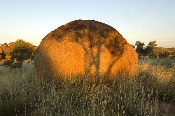 The Devils Marbles, a series of sandstone rocks perched at seemingly impossible angles