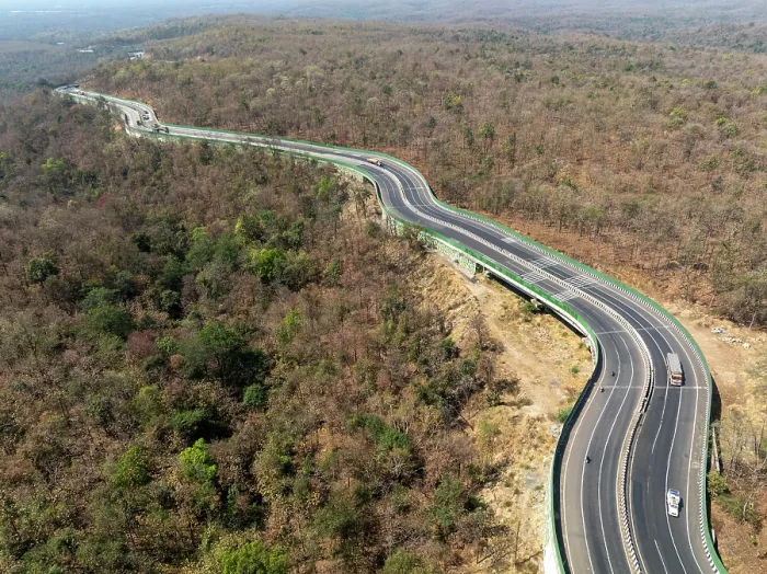 Framed Print : Drone shot of National Highway NH-44, the longest national highway in India, seen here passing through Pench Tiger Reserve, Madhya Pradesh, India Framed Print : Drone shot of National Highway NH-44, the longest national highway in India, seen here passing through Pench Tiger Reserve, Madhya Pradesh, India
