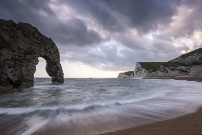Framed Print : Durdle Door, with incoming tide at sunset, near Lulworth, Dorset Jurassic coast, UK Framed Print : Durdle Door, with incoming tide at sunset, near Lulworth, Dorset Jurassic coast, UK