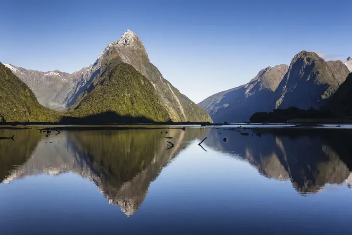 Framed Print : Early morning light on Mitre Peak (1683m) reflected in the calm waters of Milford Framed Print : Early morning light on Mitre Peak (1683m) reflected in the calm waters of Milford
