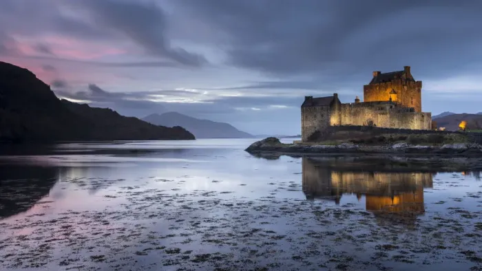 Framed Print : Eilean Donan Castle, evening light with castle illuminated, Loch Duich, Western Highlands Framed Print : Eilean Donan Castle, evening light with castle illuminated, Loch Duich, Western Highlands