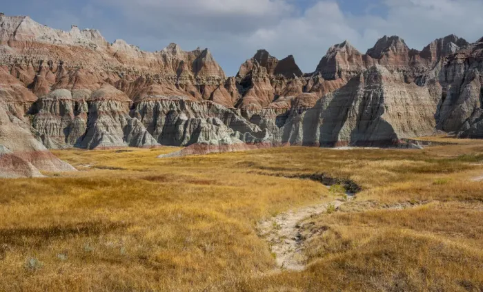 Framed Print : Eroded badlands and prairie grasses, Badlands National Park, South Dakota, USA. August Framed Print : Eroded badlands and prairie grasses, Badlands National Park, South Dakota, USA. August