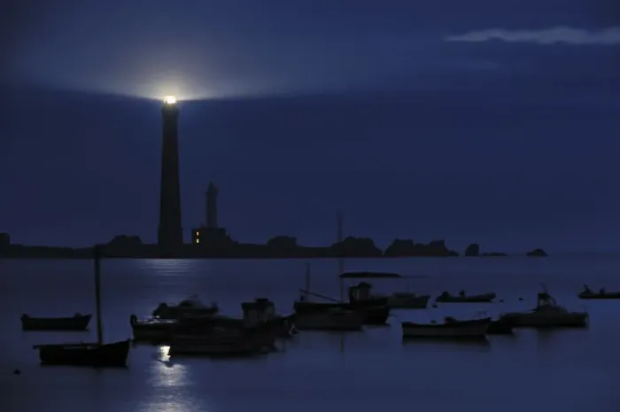 Framed Print : Fishing boats and lighthouse at night on the island Ile Vierge, Brittany, France Framed Print : Fishing boats and lighthouse at night on the island Ile Vierge, Brittany, France