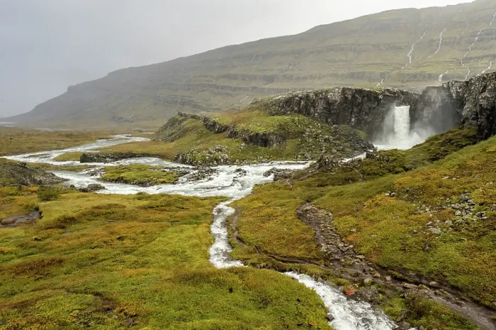 Framed Print : Foladafoss Waterfall and the Berufjaroara River during very heavy rainfall, with temporary streamlets flowing overland, east Iceland. September, 2023