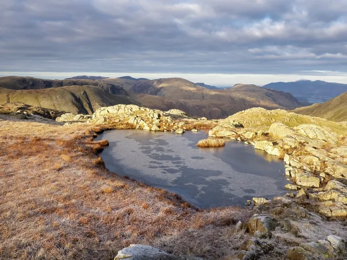 Framed Print : Frozen tarn on Glaramara mountain summit, Lake District, Cumbria, UK. December, 2022 Framed Print : Frozen tarn on Glaramara mountain summit, Lake District, Cumbria, UK. December, 2022