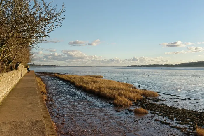 Framed Print : The Goat Walk along the Exe Estuary at dusk, Topsham, Devon, England, UK. January, 2024 Framed Print : The Goat Walk along the Exe Estuary at dusk, Topsham, Devon, England, UK. January, 2024