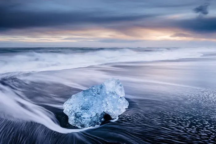 Framed Print : Ice on black volcanic sand beach with waves, Jokulsarlon, Southeast Iceland, February Framed Print : Ice on black volcanic sand beach with waves, Jokulsarlon, Southeast Iceland, February