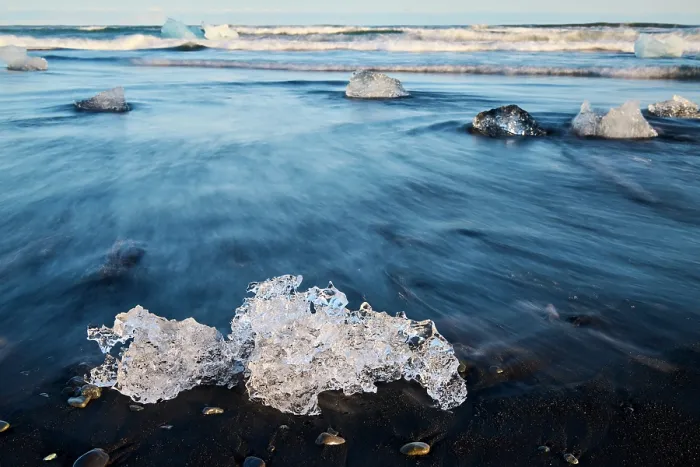 Framed Print : Ice on black, volcanic sand beach with waves on glacial lake, Diamond beach, Jokulsarlon, Vatnajokull National Park, Iceland. September, 2023 Framed Print : Ice on black, volcanic sand beach with waves on glacial lake, Diamond beach, Jokulsarlon, Vatnajokull National Park, Iceland. September, 2023