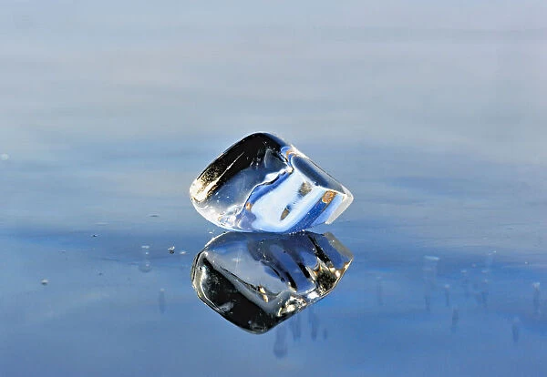 Ice fragment reflected in the ice of Lake Baikal, Siberia, Russia, March