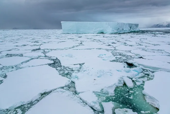 Framed Print : Iceberg amongst sea ice under dark sky, Coulman Island Area, Ross Sea, Antarctica. February, 2023 Framed Print : Iceberg amongst sea ice under dark sky, Coulman Island Area, Ross Sea, Antarctica. February, 2023