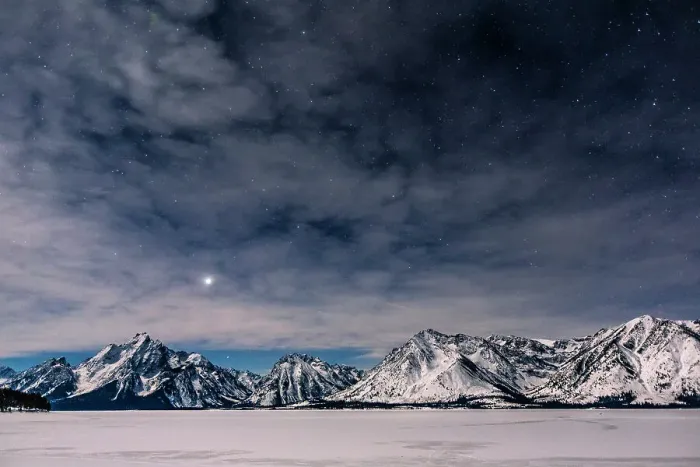 Framed Print : Jupiter setting over Mount Moran as a half moon illuminates the mountains and frozen lake below, Grand Teton National Park, USA. January 2022 Framed Print : Jupiter setting over Mount Moran as a half moon illuminates the mountains and frozen lake below, Grand Teton National Park, USA. January 2022