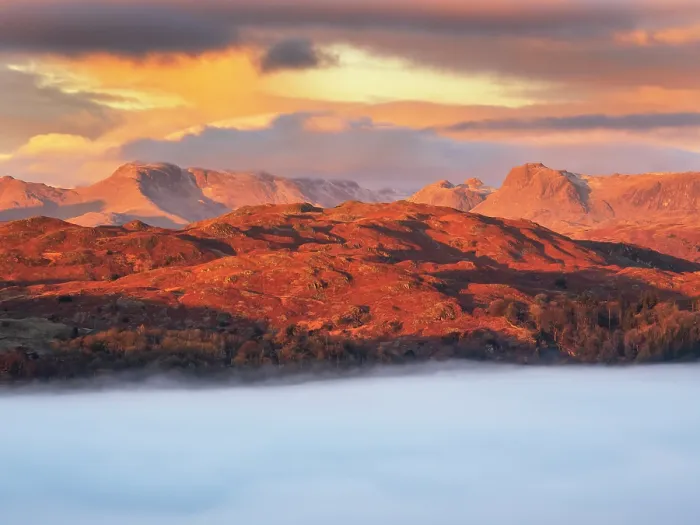 Framed Print : The Langdale Pikes and Bow Fell with valley mist, as seen from Ambleside at dawn, Lake District, UK, December 2022 Framed Print : The Langdale Pikes and Bow Fell with valley mist, as seen from Ambleside at dawn, Lake District, UK, December 2022