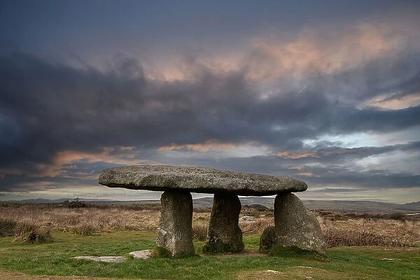 Lanyon Quoit, a Neolithic dolmen  /  tomb, under a stormy sky, Madron near St Just, Cornwall, England, UK. March, 2022