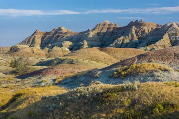 Framed Print : Late afternoon light warms the colors in the Yellow Mounds area, Badlands National Park Framed Print : Late afternoon light warms the colors in the Yellow Mounds area, Badlands National Park