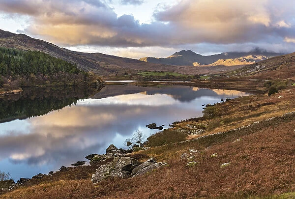 Llynnau Mymbr in early morning, view west towards cloud covered Mount Snowdon. Capel Curig