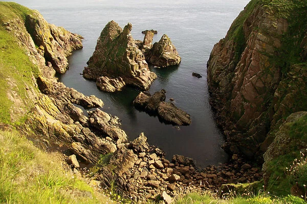 Looking down at eroded rocks off the coast of Buchan, Aberdeenshire, Scotland, August 2010