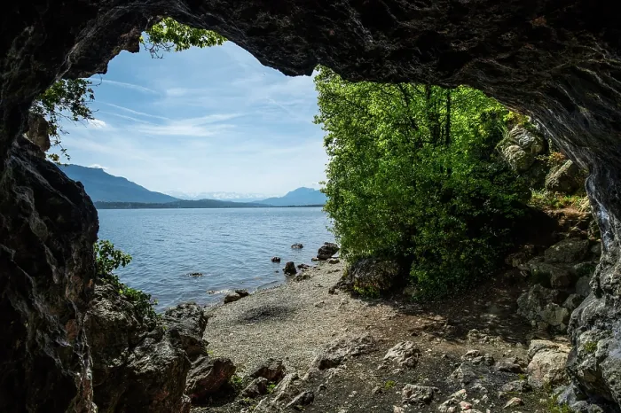 Framed Print : Looking out of Lamartine cave across Lake Bourget, Alps, Savoie, Alps, France. April, 2022