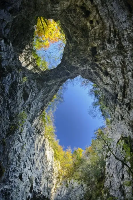 Framed Print : Looking up at the sky through the twin openings in a collapsed cave ceiling, Zelske Jame Framed Print : Looking up at the sky through the twin openings in a collapsed cave ceiling, Zelske Jame
