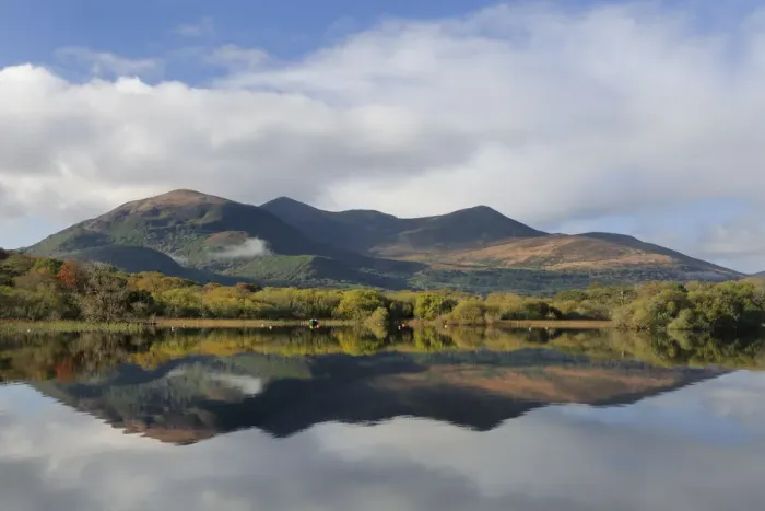 Framed Print : Macgillycuddys reeks and Lough Lean lower, photographed from Ross castle, Killarney
